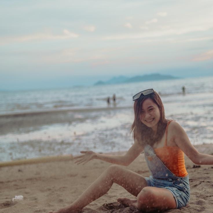 Kaveri Mehta, Lead Design Curator at WanderFolioGarden, reviewing corporate floral arrangements